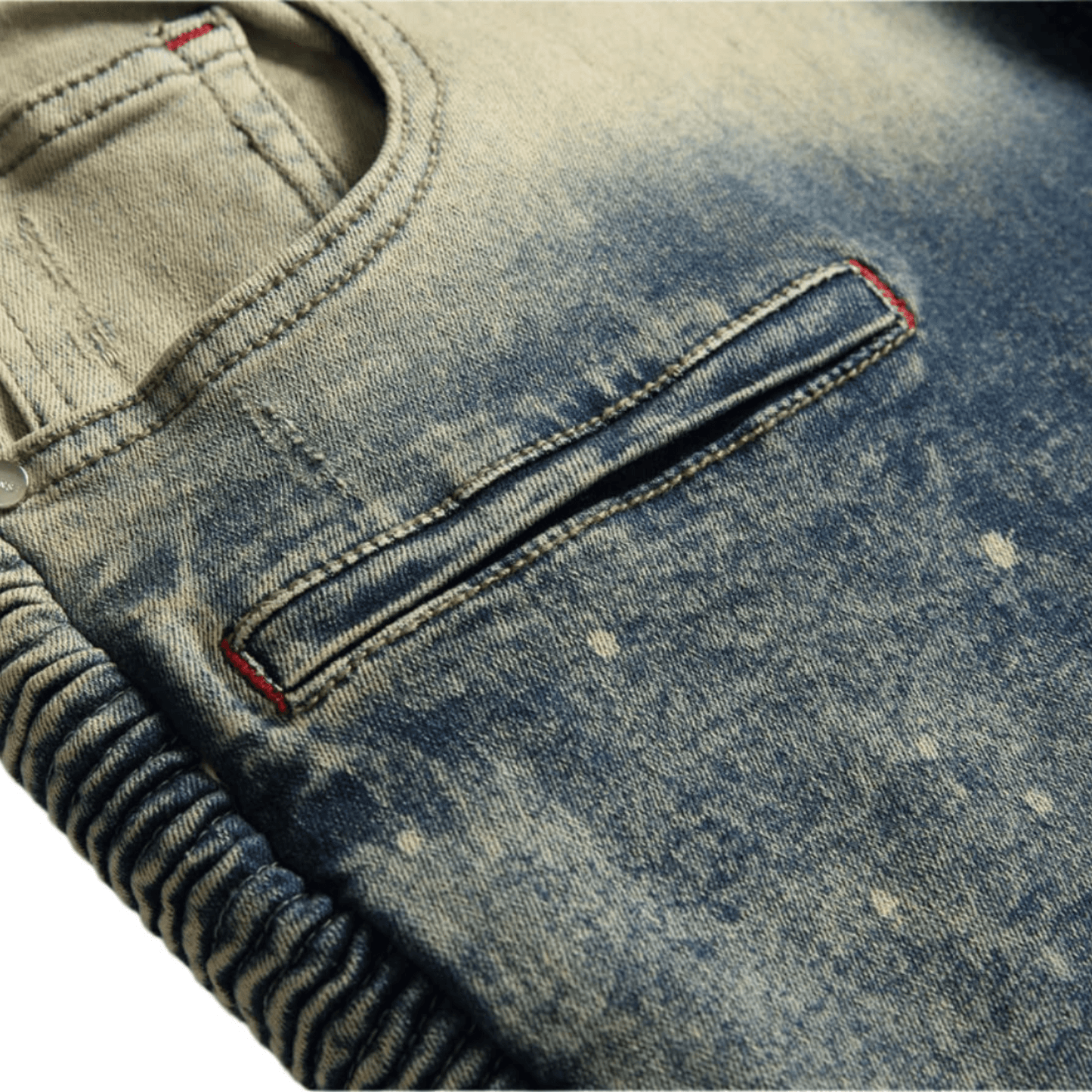 Close-up of men's relaxed-fit acid wash denim jeans showing premium fabric and unique faded design.