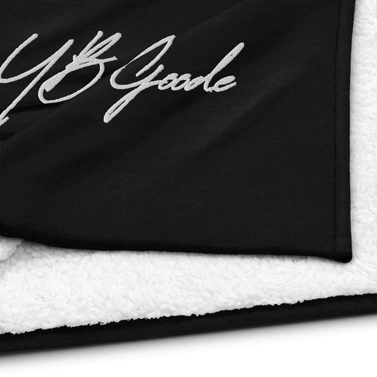 YB Goode Signature embroidered premium sherpa blanket showcasing soft fleece and cozy texture.