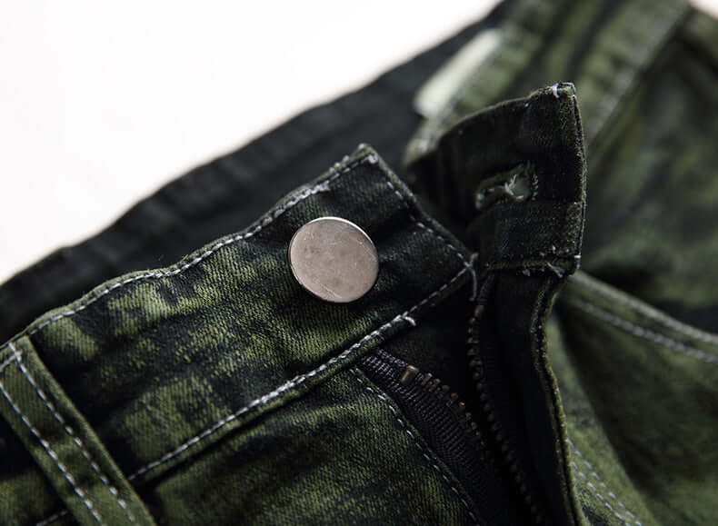 Olive green distressed men's jeans (close-up)